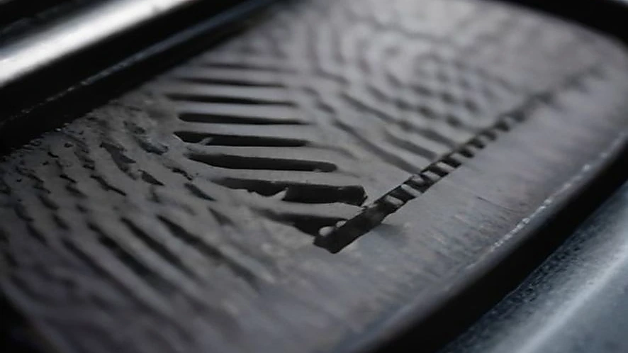 Comparison of grill brush metal bristles and grill stone abrasive surface cleaning a grill