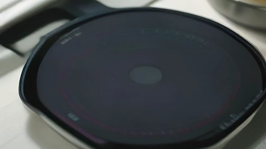 Induction cooktop control panel with digital display and buttons