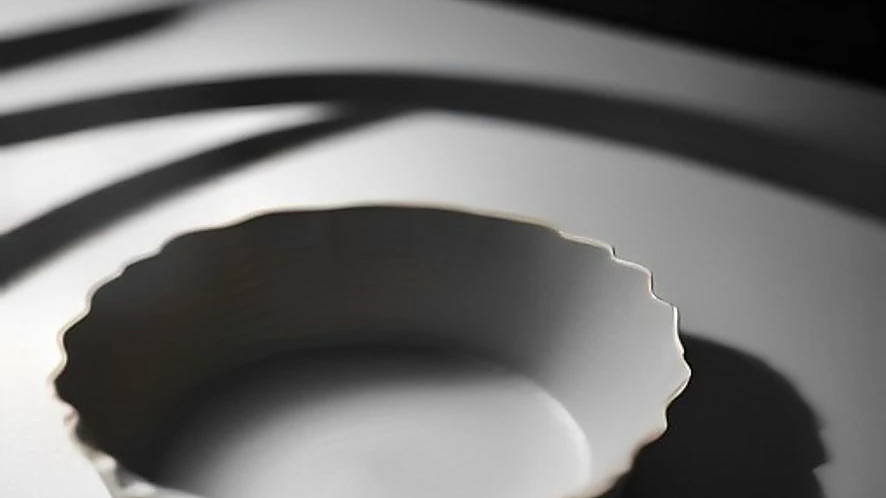 Steel tart pan showing fluted edges and removable bottom