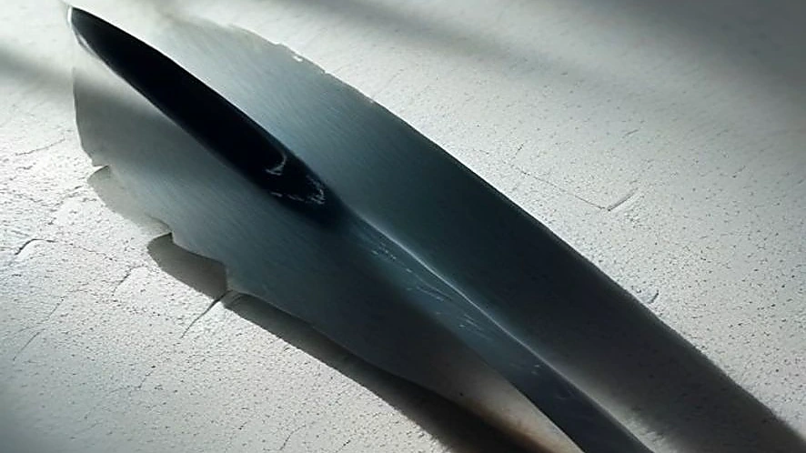 santoku knife blade with scalloped Granton edge detail