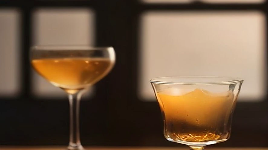 Comparison of tulip-shaped whiskey glass and rocks glass highlighting shape differences